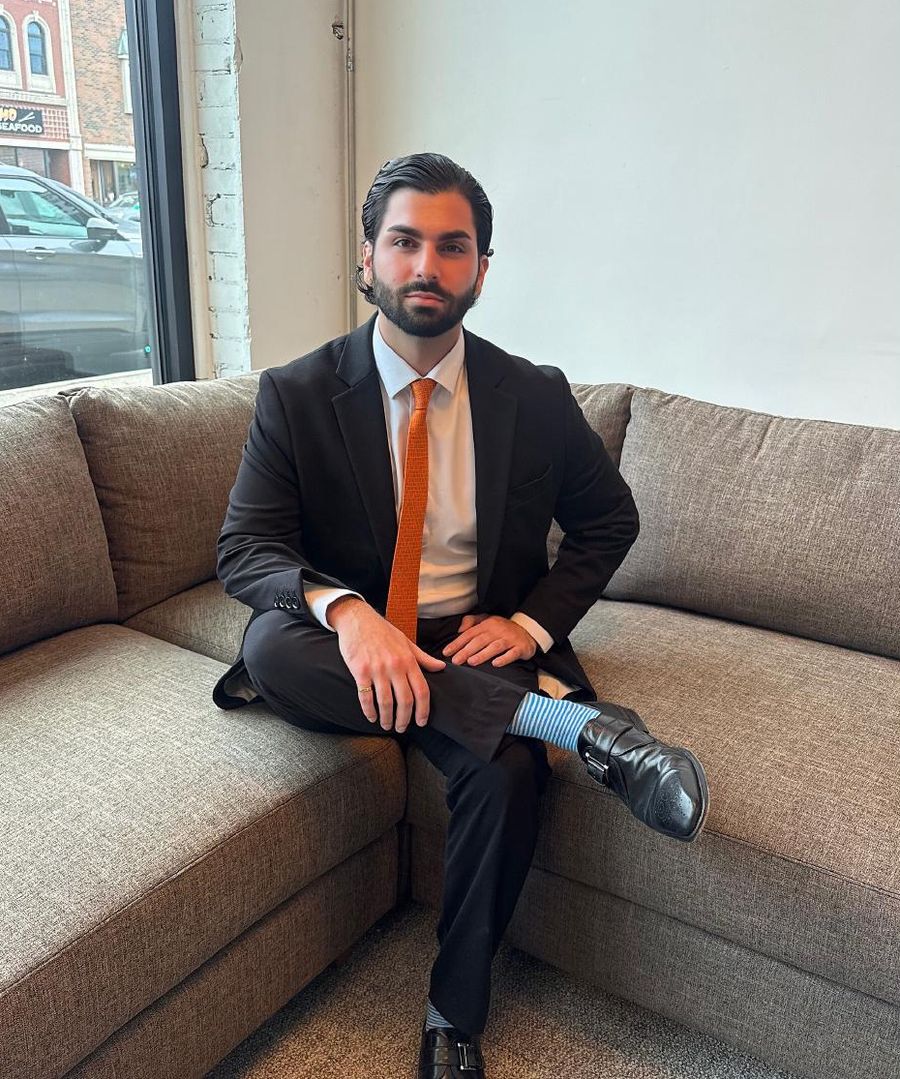 Stefano Terracciano seated in the Arterra Realty office