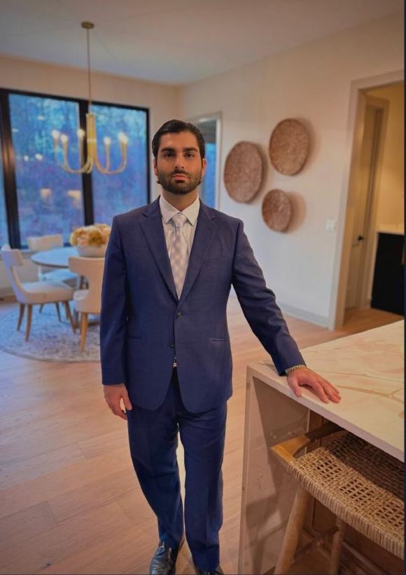 Stefano Terracciano in a navy suit